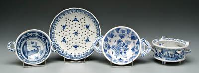 Four blue and white Delft bowls: