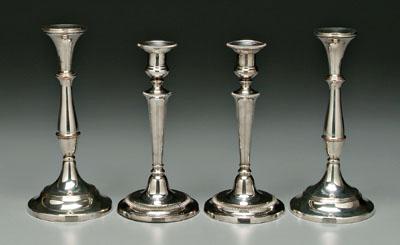 Four silver plated candlesticks  91afc