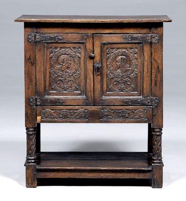 Baroque style carved oak cabinet, two