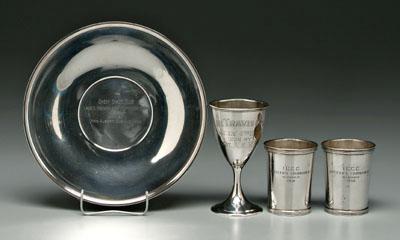 Four sterling silver trophies: one goblet