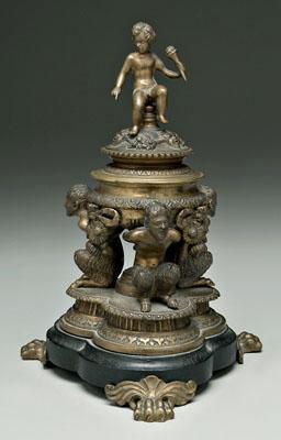 Bronze inkwell, mounted on three