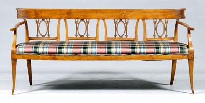 Biedermeier carved fruitwood settee,