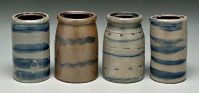 Four small stoneware canning jars  918ea