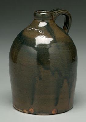 F.H. Cowden stoneware jug, runny