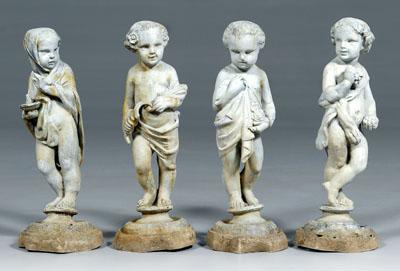 Four lead garden figures depicting 91989