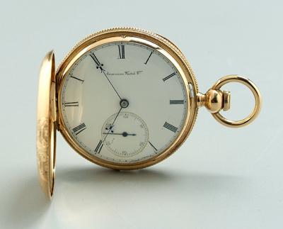 Mans gold pocket watch, porcelain face