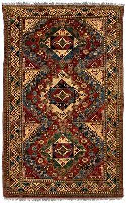 Caucasian design rug, three central