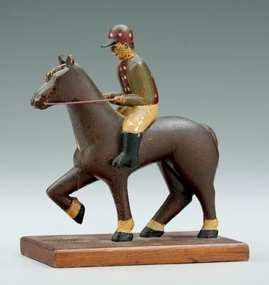 Carved jockey and horse, carved and