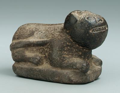 Carved stone recumbent cat, possibly