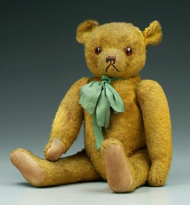 Teddy bear, jointed arms and legs,