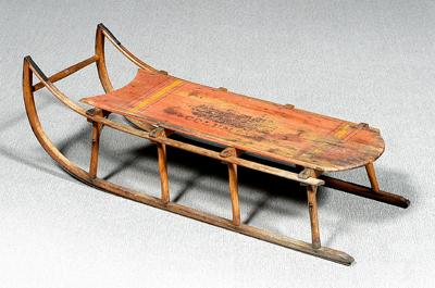 Painted wooden sled, traces original