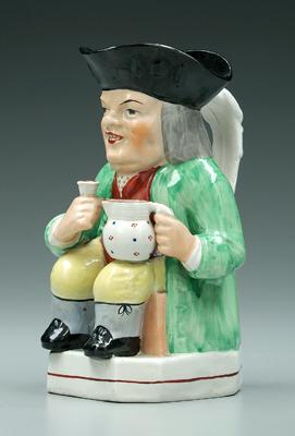 Staffordshire Toby jug, seated man with