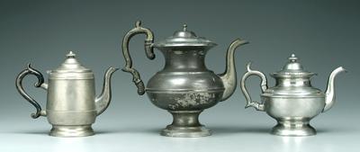 Three American pewter teapots: one marked