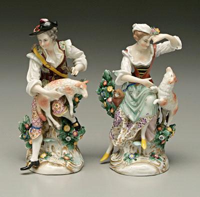 Two Chelsea figures, man holding