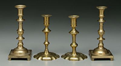 Four brass candlesticks: one pair