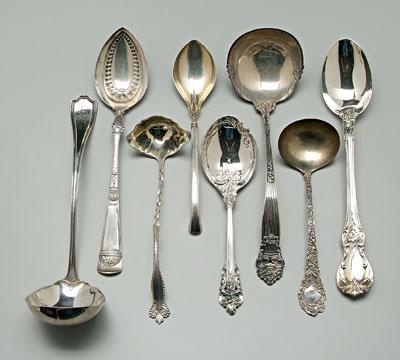 Eight large silver serving pieces: