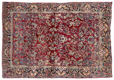 Sarouk rug, repeating floral designs