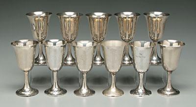 Eleven sterling goblets: eight