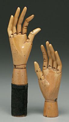 Two articulated wooden hands: maple