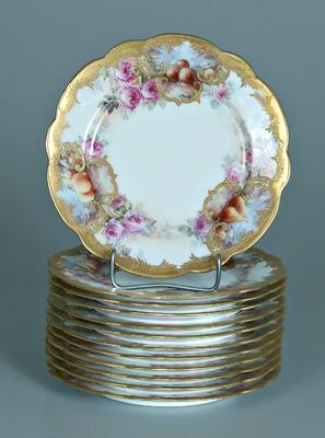 Twelve Limoges plates: scalloped