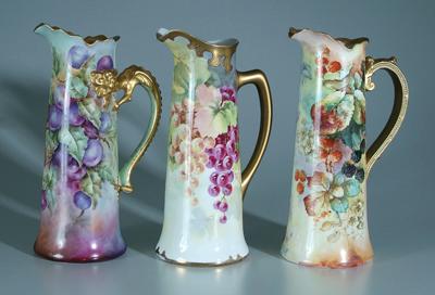 Three hand painted porcelain pitchers  925ba