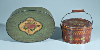 Two painted wooden boxes: one circular
