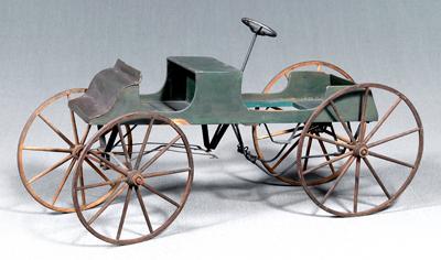 Early green-painted pedal car, large
