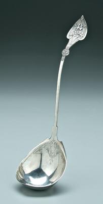 Arabesque style coin silver ladle,