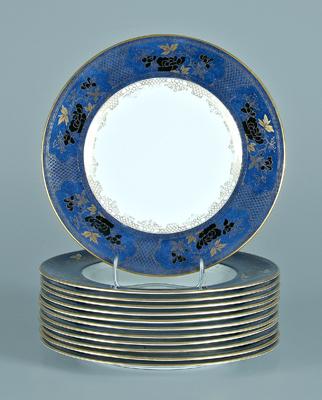 Twelve Royal Doulton plates, blue border