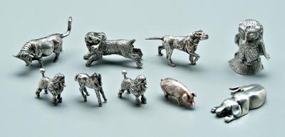 Nine miniature silver animals: four