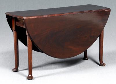 Queen Anne mahogany dining table,