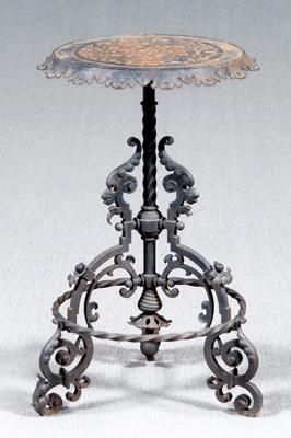 Ornate iron stand, top with scrolls