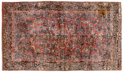 Sarouk rug, floral designs on red