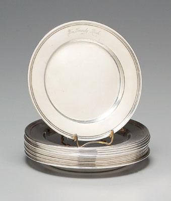 Twelve sterling plates: reeded borders,