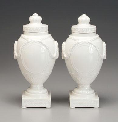 Pair Berlin porcelain urns: raised