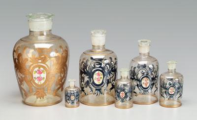 Set of six stoppered glass jars: