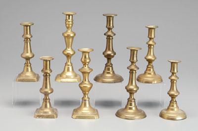 Four pairs brass candlesticks: