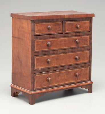 Inlaid miniature chest, bookmatched