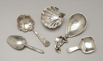 Four silver caddy spoons: one Gorham
