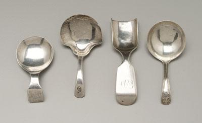 Four English silver caddy spoons:
