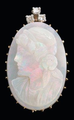 Carved opal pendant, oval tablet-cut
