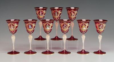 Nine ruby glass goblets: twisted stems,