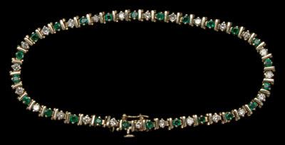 Diamond and emerald tennis bracelet,