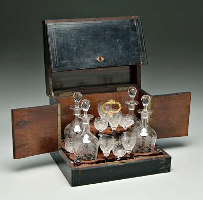 Cased decanter set: four clear