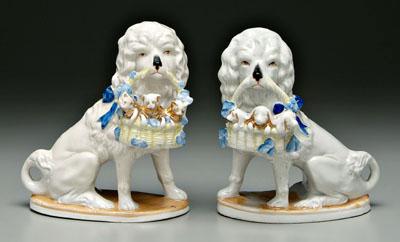 Pair porcelain seated dogs holding 93336