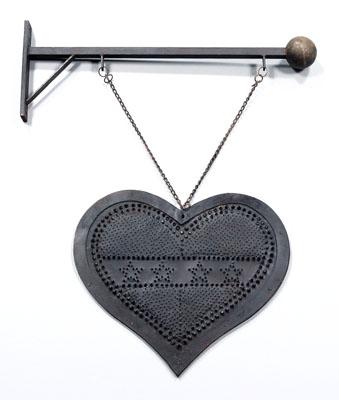 Punched iron heart-shaped trade sign,