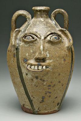 B. B. Craig stoneware face jug, two