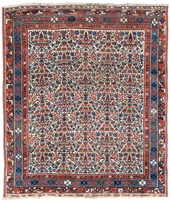 Afshar rug, ivory central field