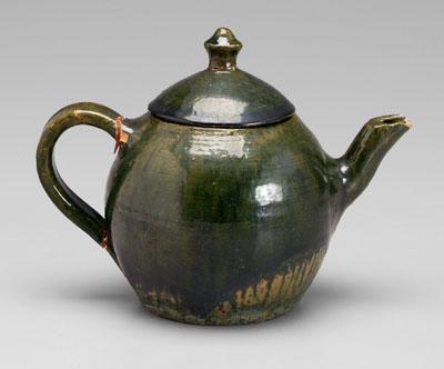 Earthenware teapot, green glaze,