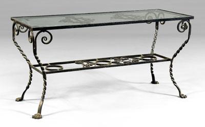 Wrought iron and glass garden table,